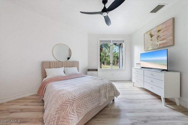 1240 Desoto Blvd S, Naples, FL 34117 - bedroom featuring light wood-style flooring and ceiling fan