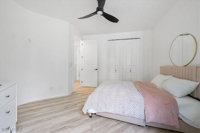 1240 Desoto Blvd S, Naples, FL 34117 - bedroom featuring light wood finished floors, a closet, and ceiling fan