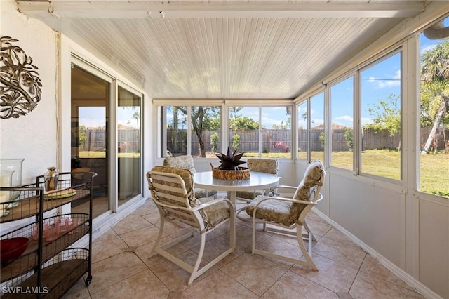 sunroom / solarium with wooden ceiling