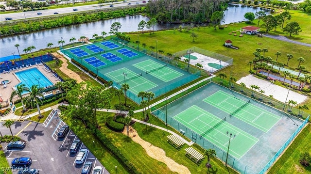 bird's eye view with a water view