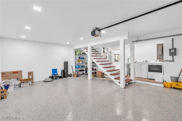 8080 Lagoon Rd, Fort Myers Beach, FL 33931 - below grade area with washing machine and clothes dryer, recessed lighting, stairway, electric panel, and a garage