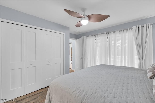 8080 Lagoon Rd, Fort Myers Beach, FL 33931 - bedroom featuring wood finished floors, a closet, and ceiling fan