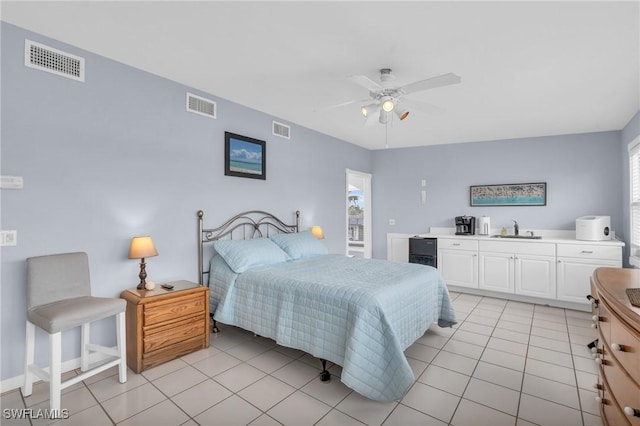 8080 Lagoon Rd, Fort Myers Beach, FL 33931 - bedroom with a sink, light tile patterned floors, baseboards, and a ceiling fan