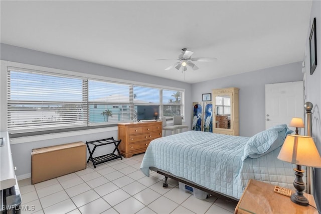 8080 Lagoon Rd, Fort Myers Beach, FL 33931 - bedroom with light tile patterned flooring and a ceiling fan
