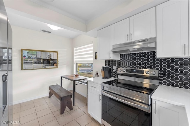 kitchen with visible vents, stainless steel electric range, under cabinet range hood, and white cabinets