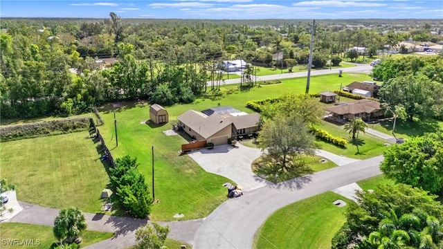 6451 Scott Ln, Fort Myers, FL 33966 - birds eye view of property with a forest view
