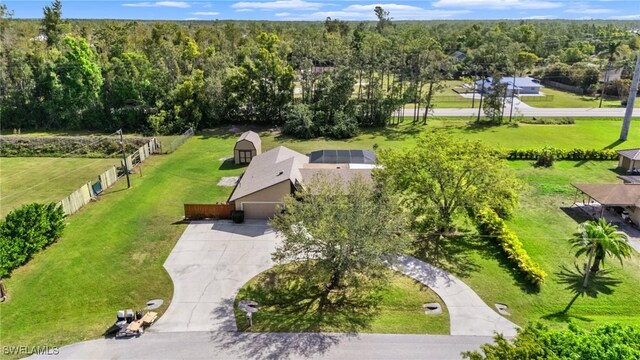 6451 Scott Ln, Fort Myers, FL 33966 - drone / aerial view featuring a forest view