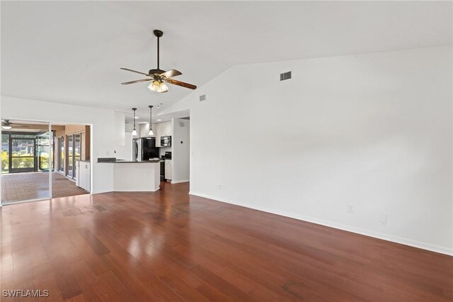 6451 Scott Ln, Fort Myers, FL 33966 - unfurnished living room featuring visible vents, dark wood-type flooring, ceiling fan, high vaulted ceiling, and baseboards