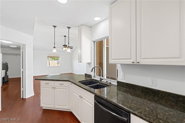 6451 Scott Ln, Fort Myers, FL 33966 - kitchen with dark wood-style floors, white cabinets, a sink, dark stone countertops, and dishwashing machine