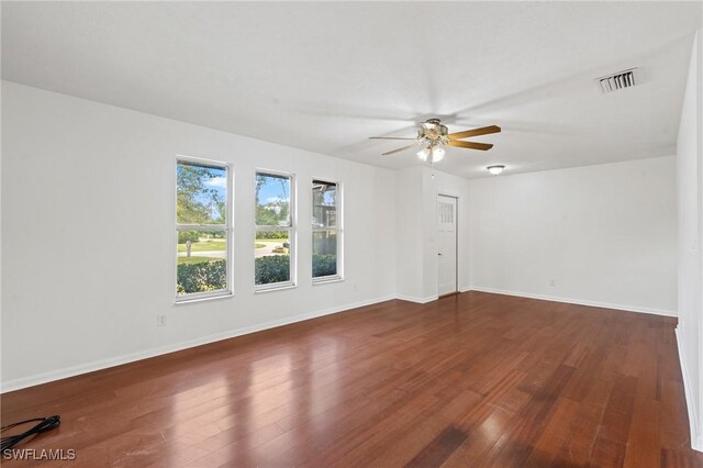 6451 Scott Ln, Fort Myers, FL 33966 - unfurnished room featuring visible vents, baseboards, and wood finished floors