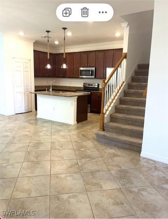 kitchen with crown molding, dark countertops, hanging light fixtures, appliances with stainless steel finishes, and a sink