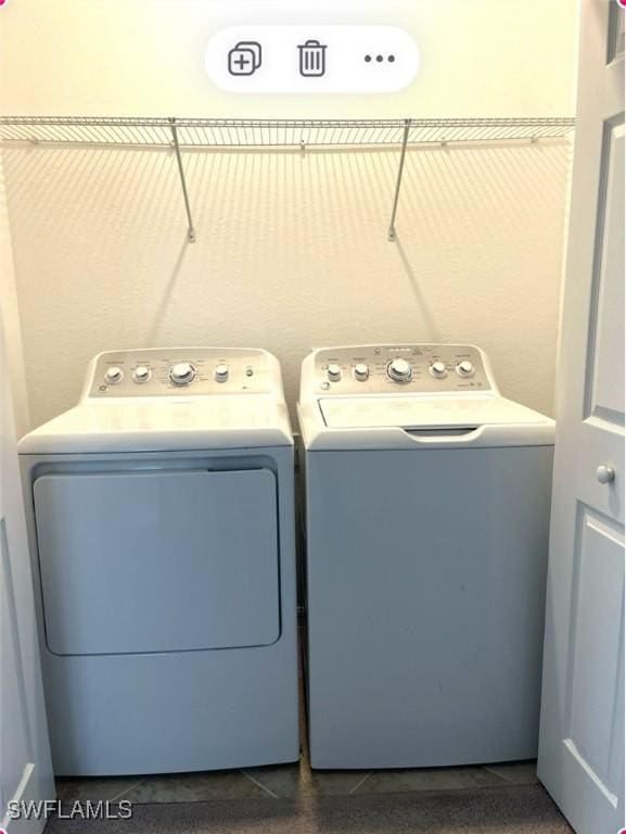 laundry area featuring laundry area and washing machine and clothes dryer