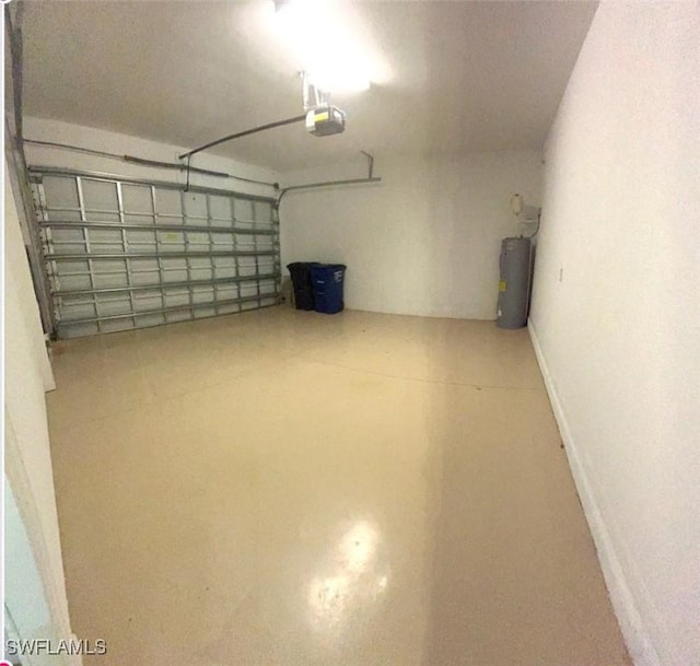 garage featuring baseboards and a garage door opener