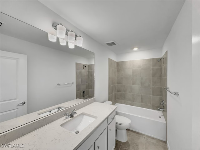 bathroom with visible vents, bathing tub / shower combination, toilet, tile patterned floors, and vanity