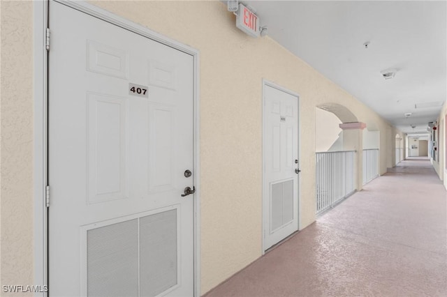 hallway with finished concrete flooring