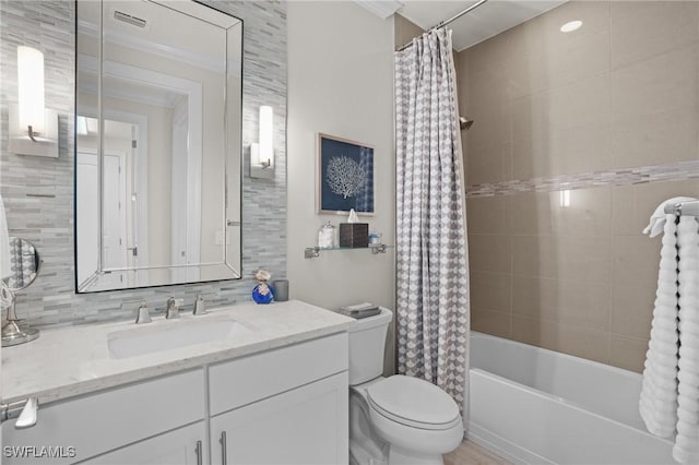 full bathroom featuring shower / bathtub combination with curtain, toilet, vanity, decorative backsplash, and crown molding