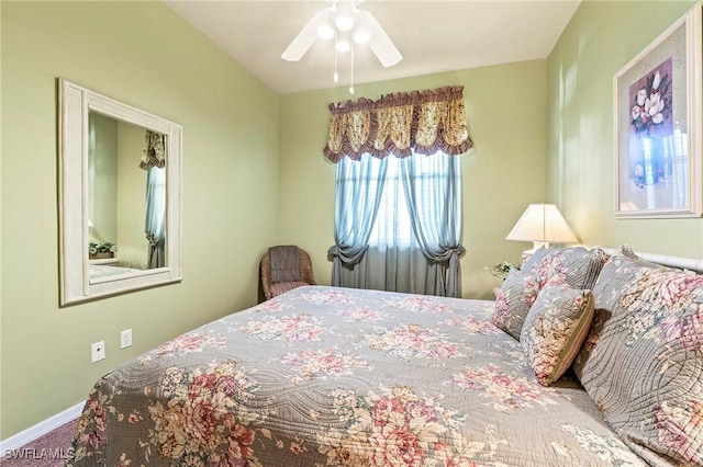 bedroom with ceiling fan, carpet floors, and baseboards