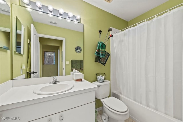 bathroom with shower / tub combo, vanity, and toilet