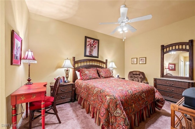 bedroom featuring light carpet and ceiling fan