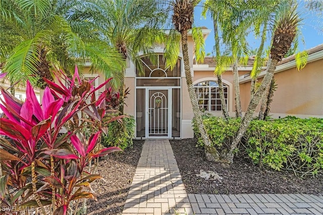 3266 Sturgeon Bay Ct, Naples, FL 34120 - property entrance with stucco siding