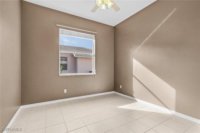 3266 Sturgeon Bay Ct, Naples, FL 34120 - spare room with a ceiling fan, baseboards, and tile patterned floors