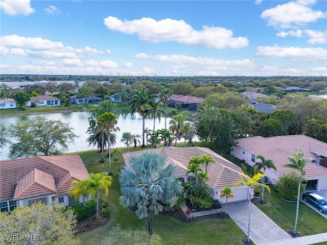 drone / aerial view with a water view