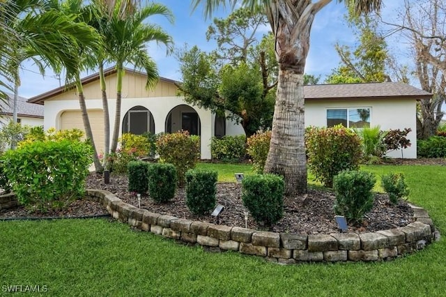 view of yard featuring an attached garage