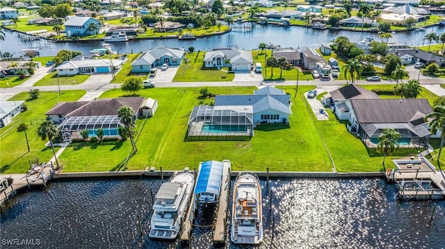 aerial view with a water view and a residential view