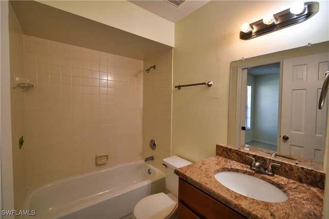 full bathroom with shower / bathing tub combination, vanity, and toilet