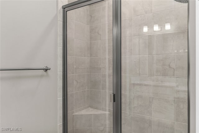 full bathroom with a shower stall