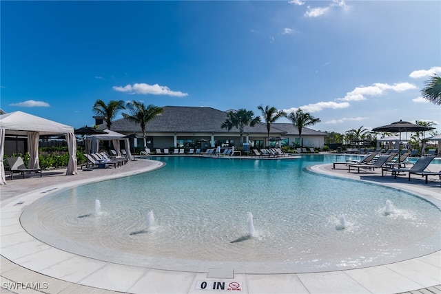 community pool featuring a patio area and a gazebo