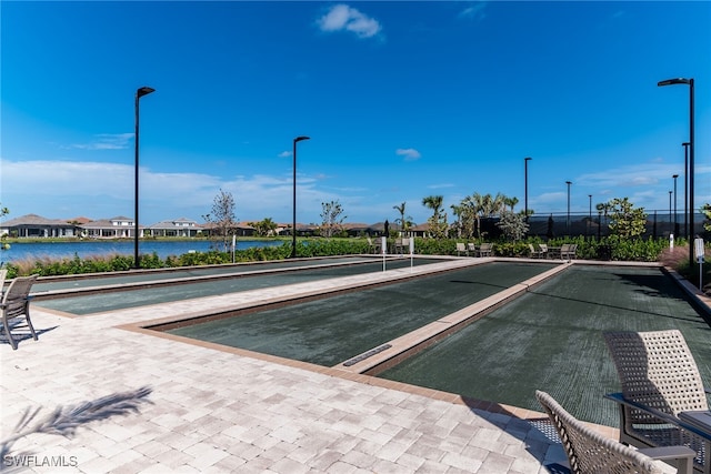 view of home's community featuring a water view