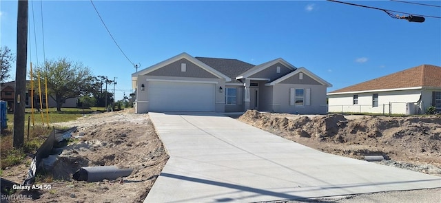 view of front of house featuring a garage and driveway