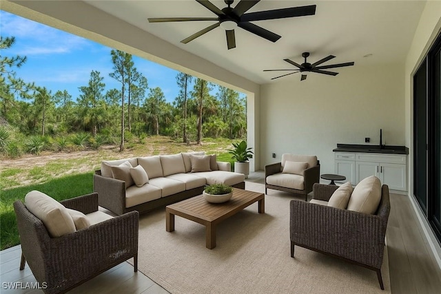 1929 14th Ave NE, Naples, FL 34120 - view of patio / terrace featuring ceiling fan, outdoor lounge area, and a sink
