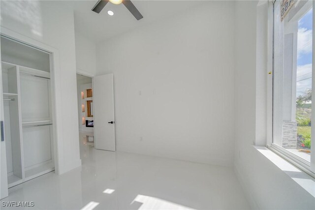149 SE 21st St, Cape Coral, FL 33990 - unfurnished bedroom featuring tile patterned floors, ceiling fan, and a closet