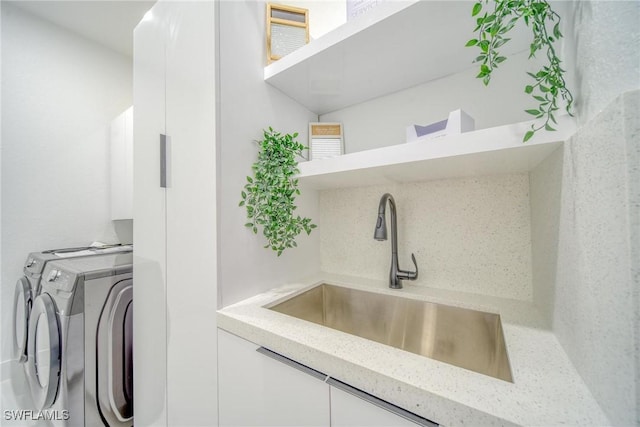 149 SE 21st St, Cape Coral, FL 33990 - laundry room with laundry area, a sink, and washer and dryer