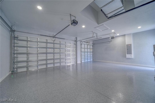 149 SE 21st St, Cape Coral, FL 33990 - garage featuring recessed lighting, baseboards, a garage door opener, and electric panel