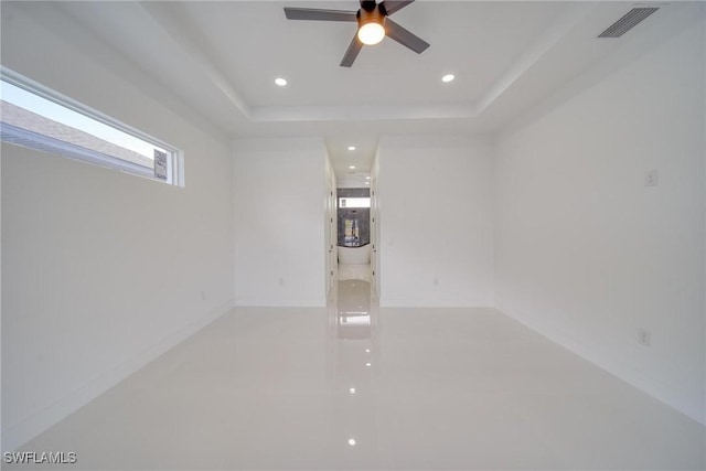 149 SE 21st St, Cape Coral, FL 33990 - empty room with recessed lighting, a ceiling fan, a tray ceiling, and visible vents