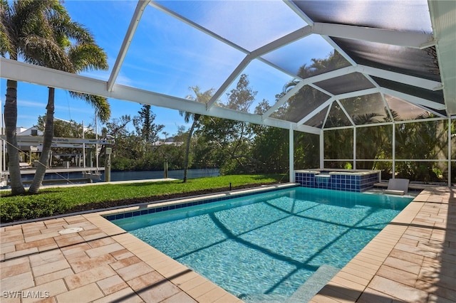 pool with a patio and a lanai