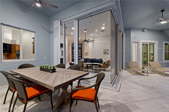 dining room featuring ceiling fan