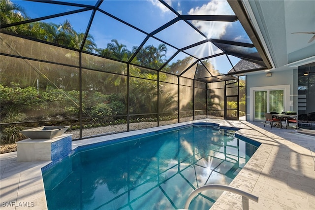 pool with a patio area and a lanai