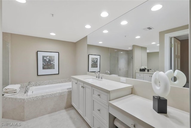 full bath with visible vents, a garden tub, a stall shower, recessed lighting, and vanity