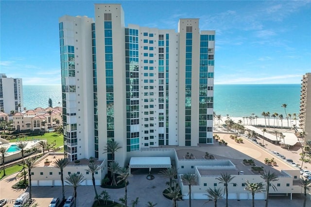 view of building exterior featuring a water view