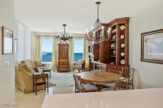 970 Cape Marco Dr Unit 1107, Marco Island, FL 34145 - dining space with a chandelier