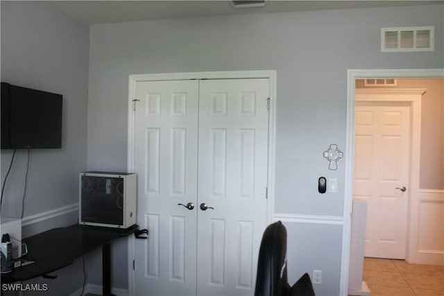 home office with visible vents and light tile patterned flooring