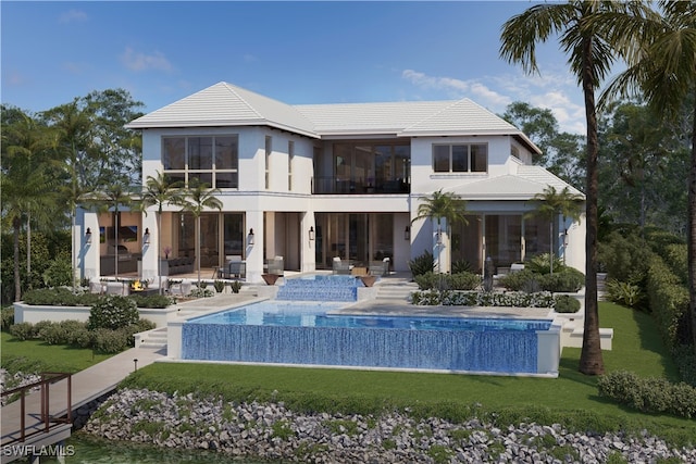 back of property featuring a patio, a lawn, an infinity pool, and stucco siding