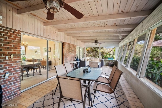 sunroom / solarium featuring wooden ceiling, beam ceiling, and ceiling fan with notable chandelier