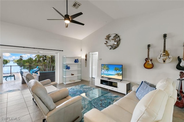 living room with high vaulted ceiling, ceiling fan, and visible vents