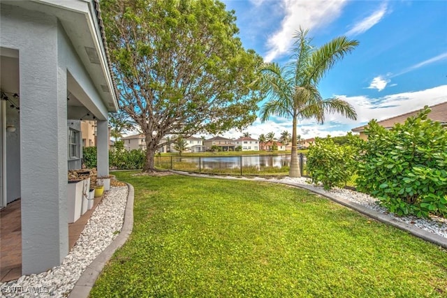 view of yard with a water view