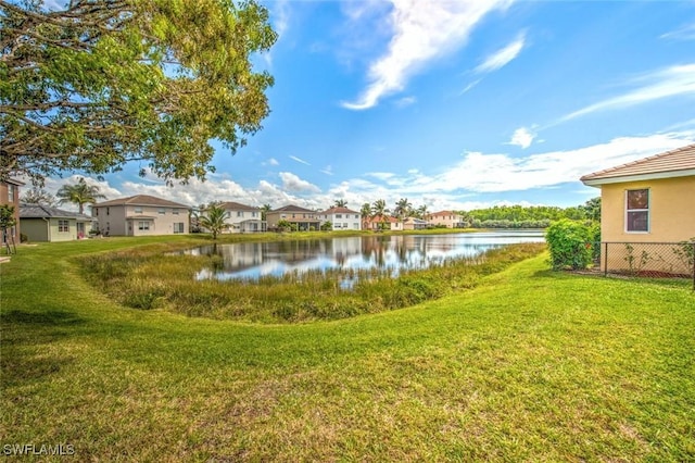 view of water feature with a residential view